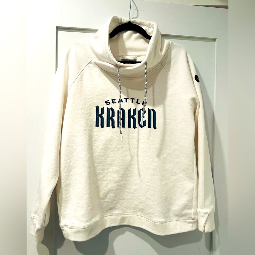 Women’s Large Kraken Sweatshirt from the pro shop with cute back.